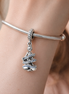 Stacked Silver Tree Charm - Tiny Silver Stacked Tree Charm — worn on wrist