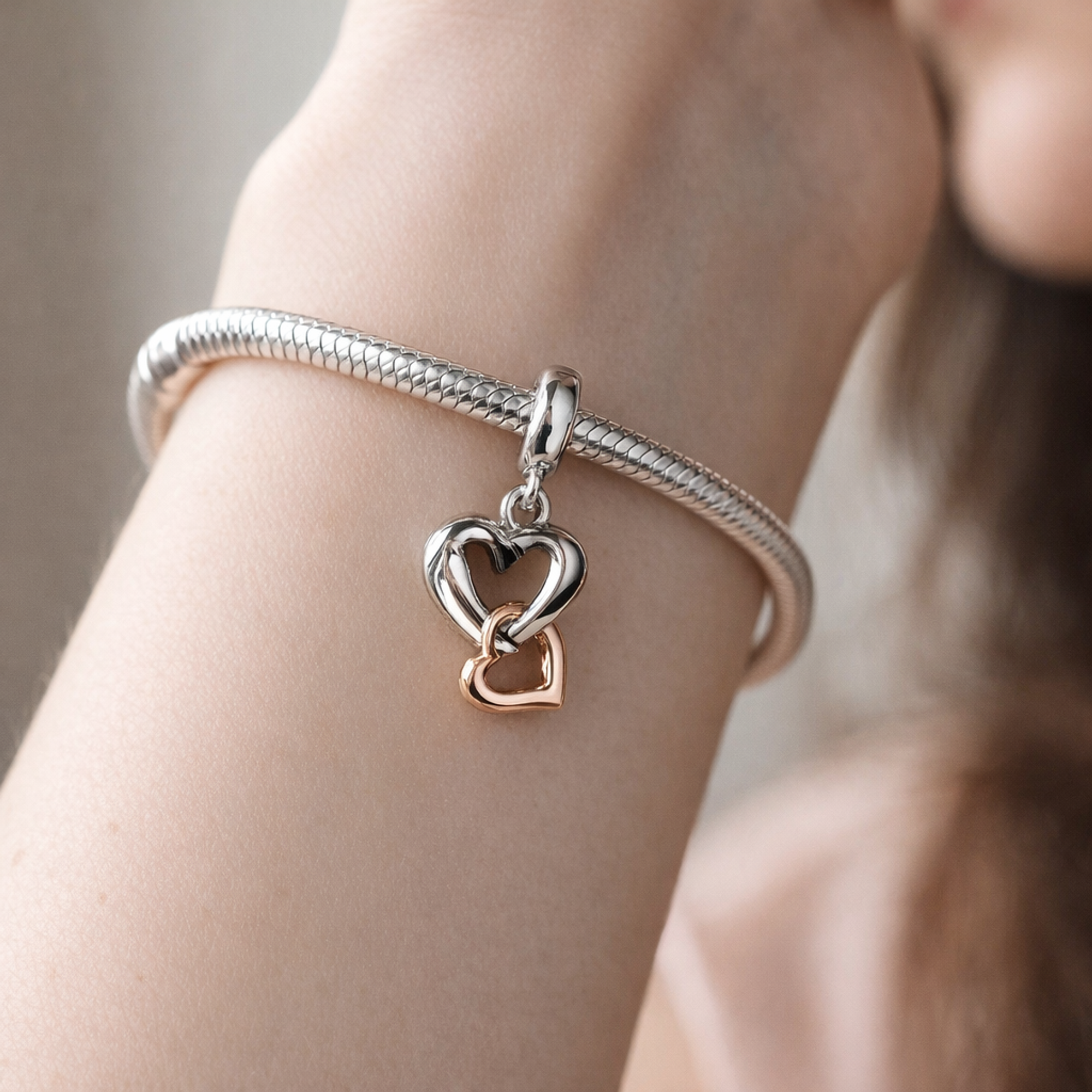 Rose Gold Plated Heart Loop Charm - Silver Heart with Rose Gold Plated Loop Charm — worn on wrist