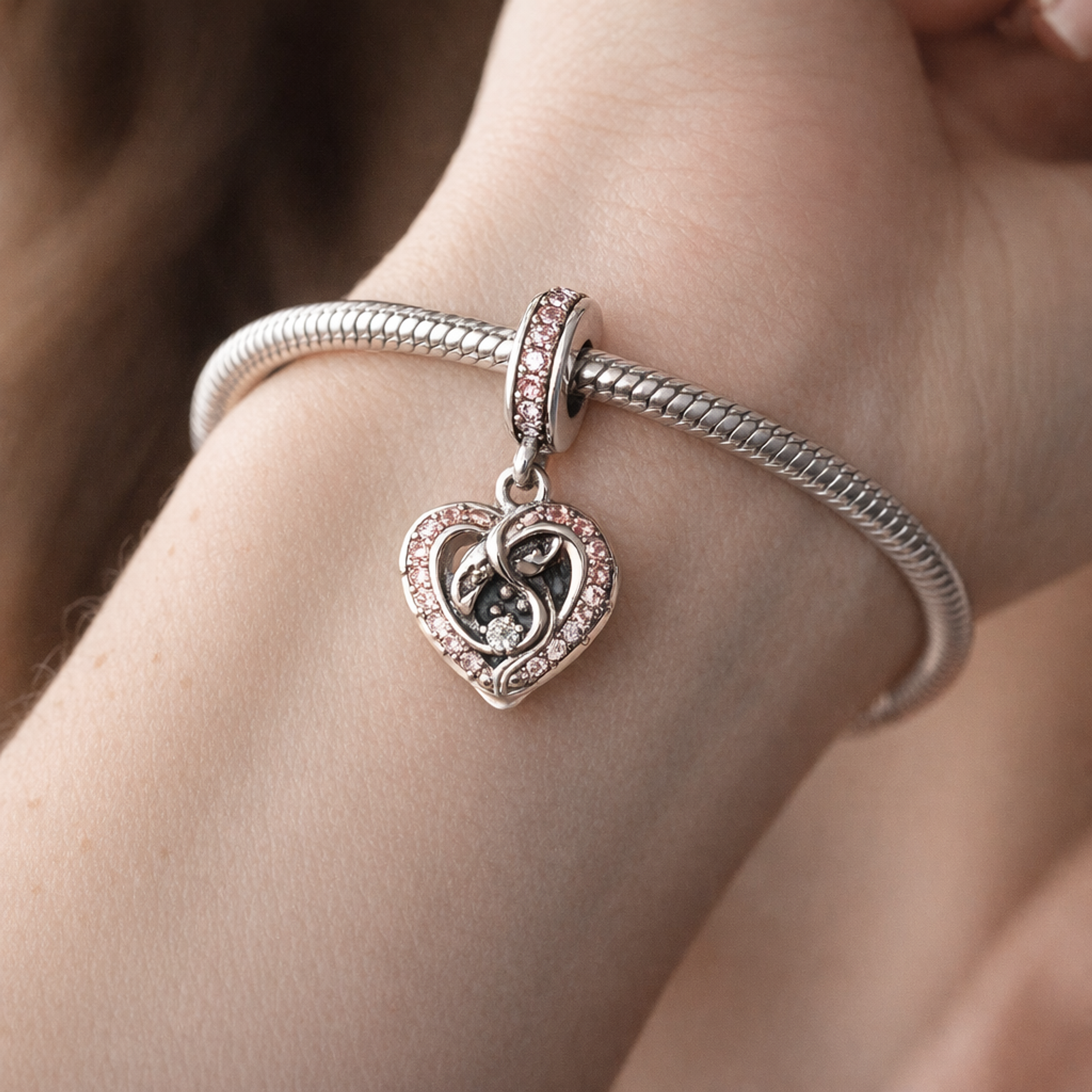 Two-tone Infinity Heart Double Dangle Charm — worn on wrist