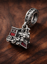 Red Train Charm - Red Locomotive Train Charm — display on walnut