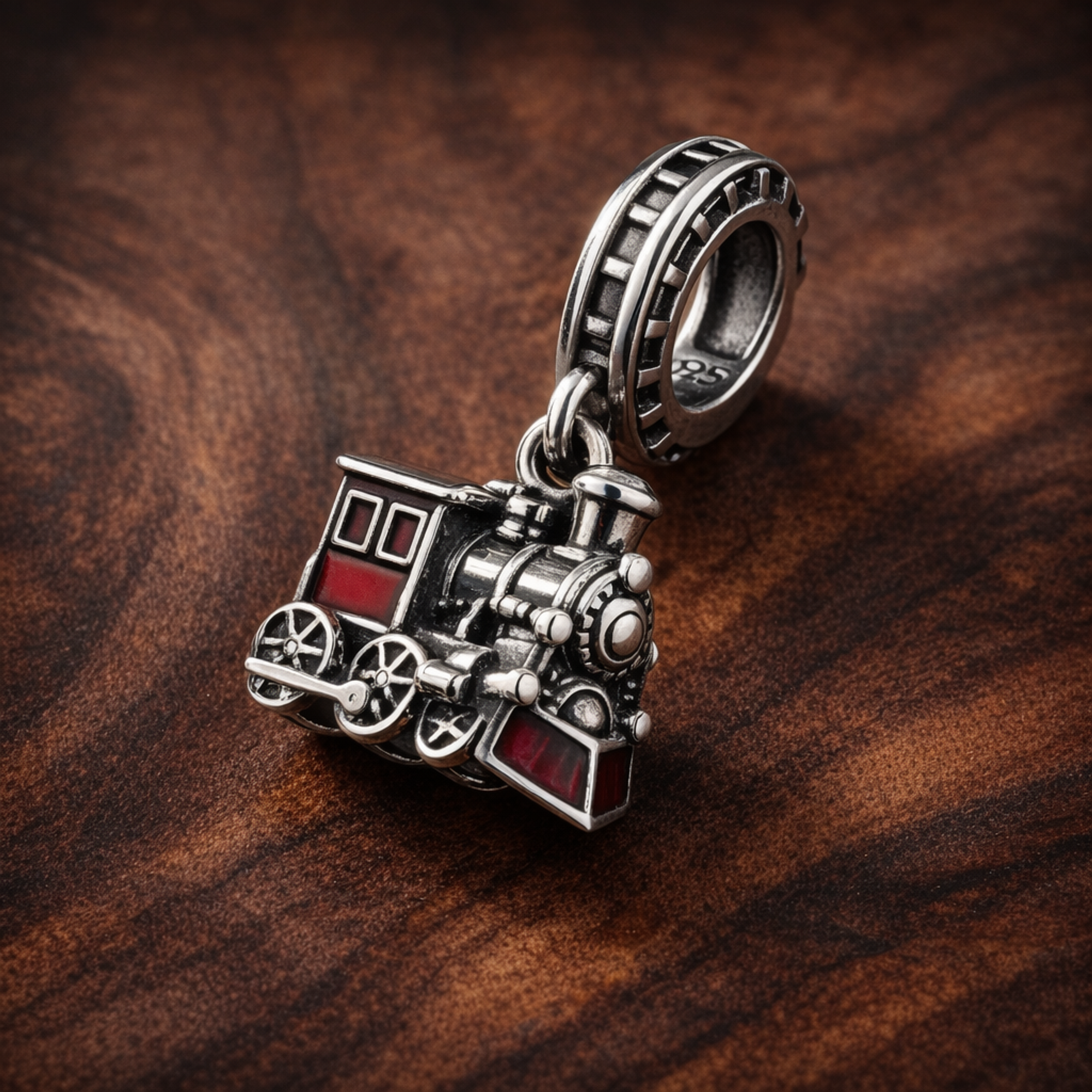 Red Train Charm - Red Locomotive Train Charm — display on walnut