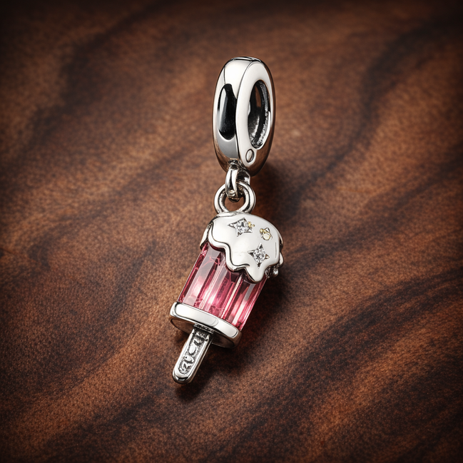 Sprinkled Popsicle Dangle Charm — display on walnut