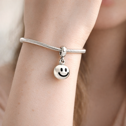 Smiley Face Charm - Silver Smiley Face Dangle Charm — worn on wrist