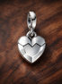 Broken Heart Charm - Silver Broken Heart Dangle Charm — display on walnut