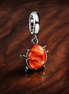 Orange Charm - Orange Citrus Fruit Dangle Charm — display on walnut