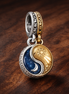 Two-tone Splittable Sun & Moon Dangle Charm — display on walnut