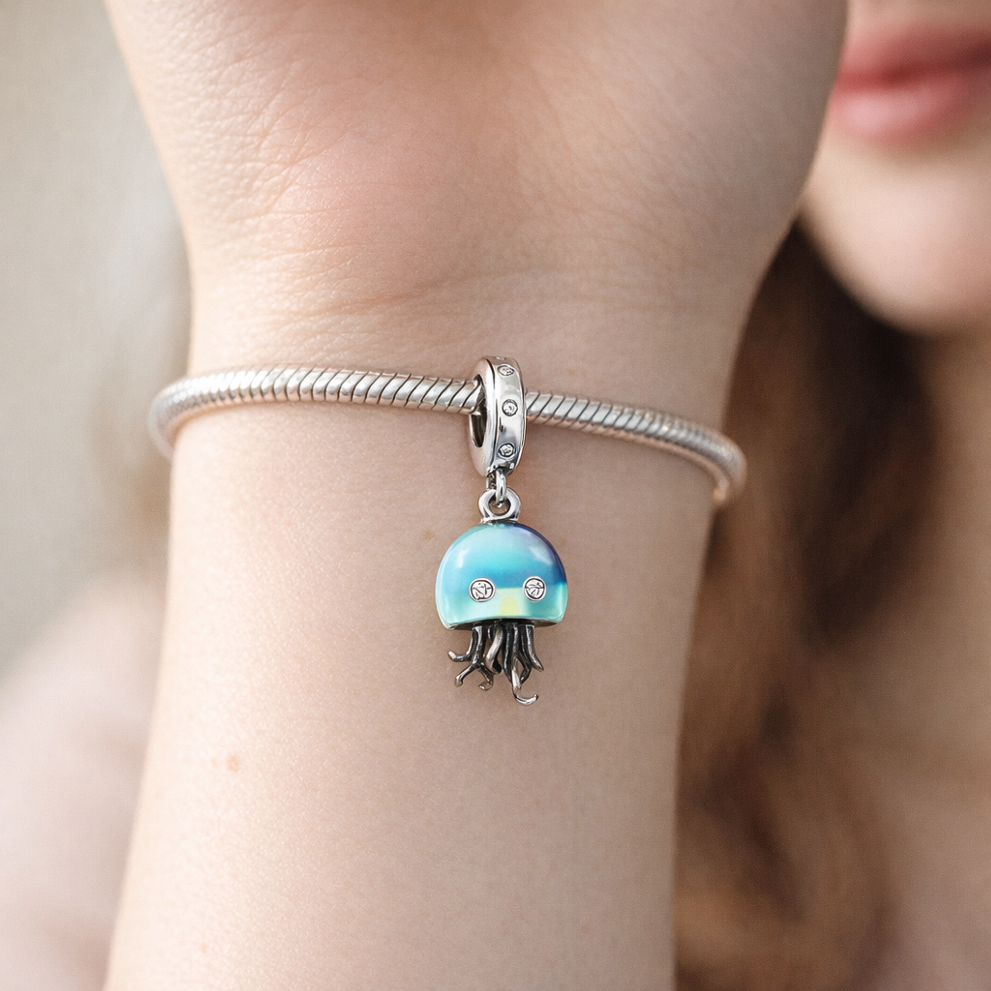 Color-changing Jellyfish Dangle Charm — worn on wrist