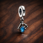 Graduation Cap Key Charm - Graduation Key and Cap Dangle Charm — display on walnut