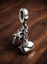 Moka Pot Dangle Charm — display on walnut