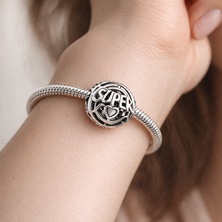 Super Mom Charm - Super Mom Openwork Charm — worn on wrist