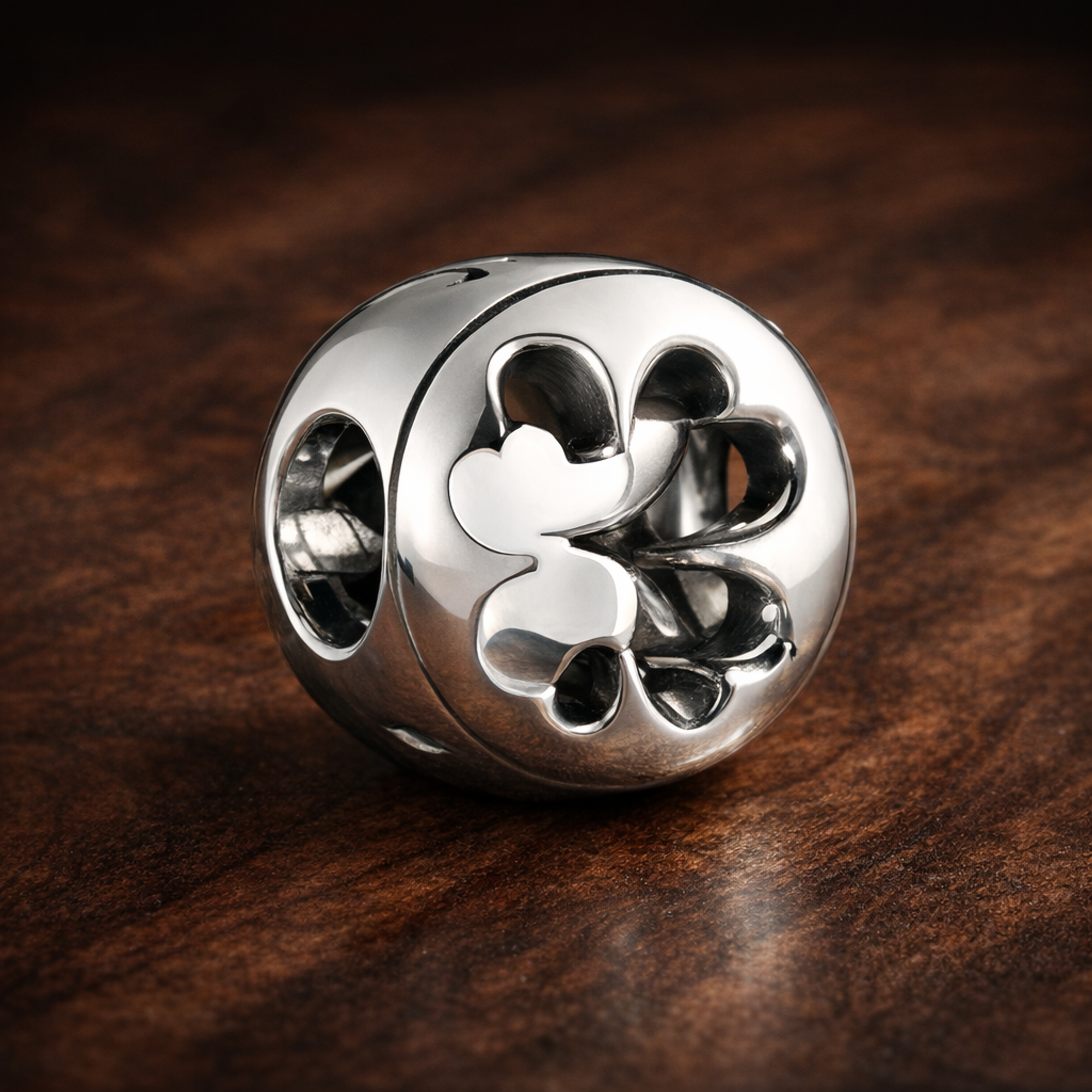 Open Clover Luck Charm - Open Four-Leaf Clover Charm — display on walnut