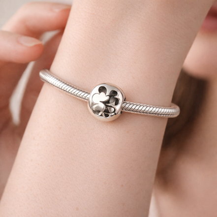 Open Clover Luck Charm - Open Four-Leaf Clover Charm — worn on wrist
