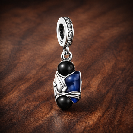 Blue Gem Dangle Charm - Deep Blue Gem Drop Charm — display on walnut