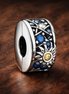 Day and Night Sun Moon Bead - Blue Sun Moon Celestial Bead — display on walnut