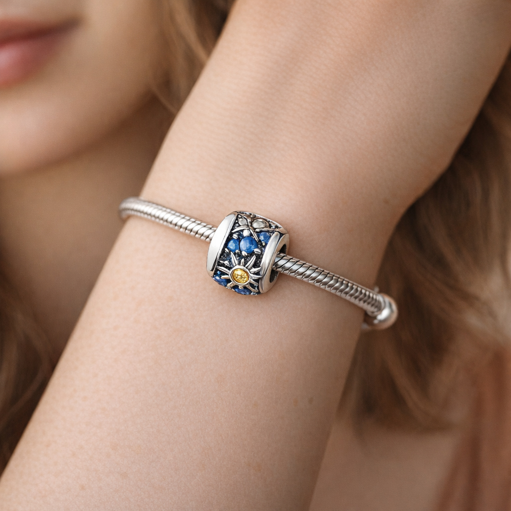 Day and Night Sun Moon Bead - Blue Sun Moon Celestial Bead — worn on wrist