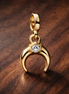 Gold Plated Crescent Moon Charm - Gold Plated Crescent Moon Stone Charm — display on walnut