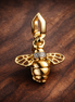 Sparkling Bee Dangle Charm — display on walnut