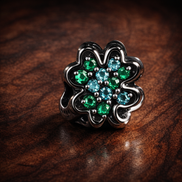 Splittable Four Leaf Clover Charm — display on walnut
