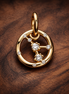 Gold Plated Zodiac Crab Medallion - Gold Plated Zodiac Crab Medallion Charm — display on walnut