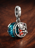 Disney Lilo & Stitch Family Dangle Charm — display on walnut