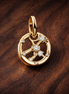 Sagittarius Zodiac Charm - Gold Plated Sagittarius Zodiac Charm — display on walnut