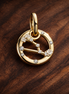 Scorpio Zodiac Charm - Gold Plated Scorpio Zodiac Charm — display on walnut