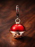 Santa Face Bell Charm - Santa Face Holiday Dangle Charm — display on walnut