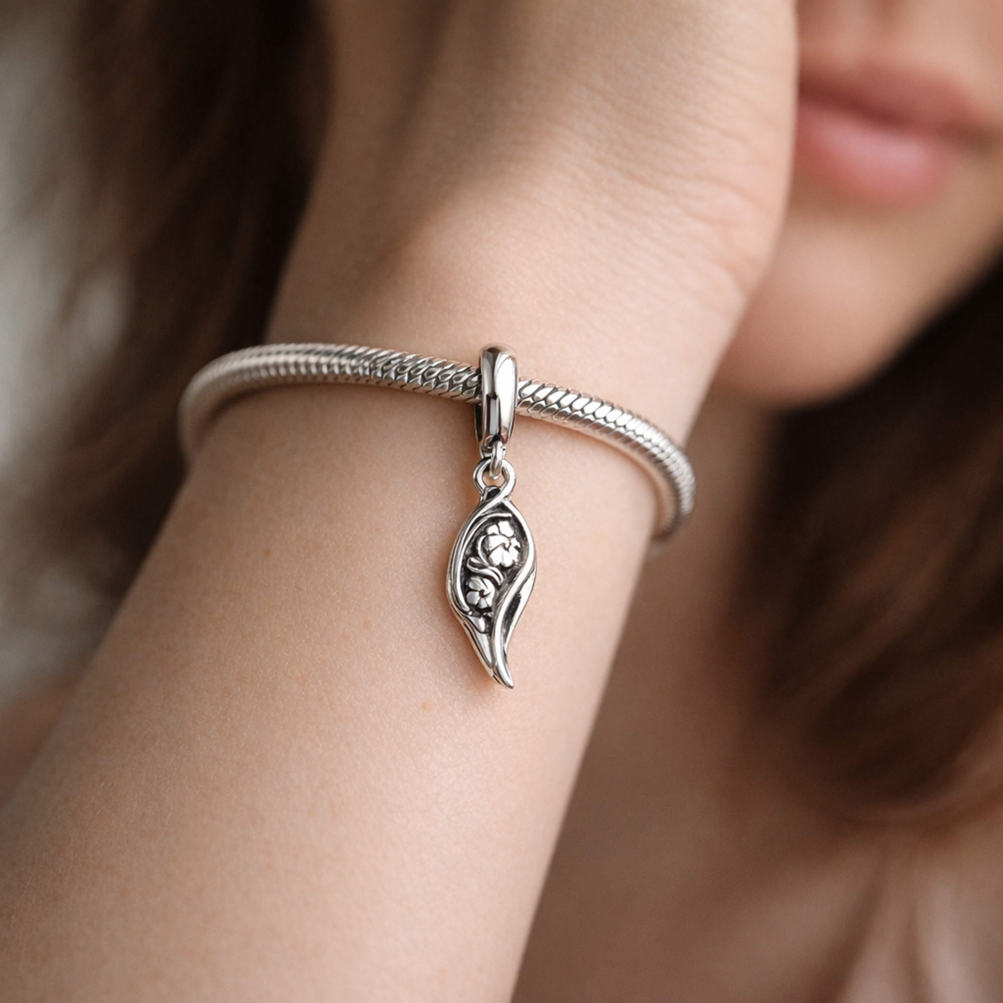 Pandora ME Sparkling Angel Wing Mini Dangle Charm — worn on wrist