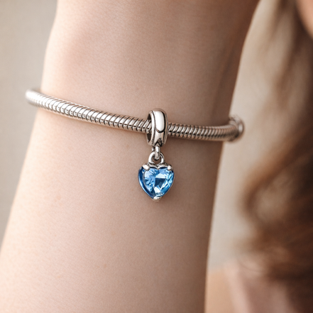 Pandora ME Blue Chakra Heart Mini Dangle Charm — worn on wrist