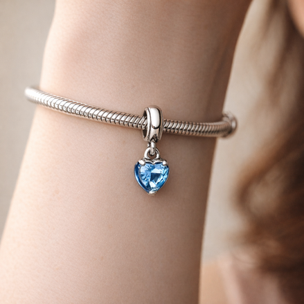 Pandora ME Blue Chakra Heart Mini Dangle Charm — worn on wrist