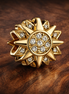 Gold Plated Sunflower Pavé Charm - Gold Plated Sunburst Crystal Charm — display on walnut