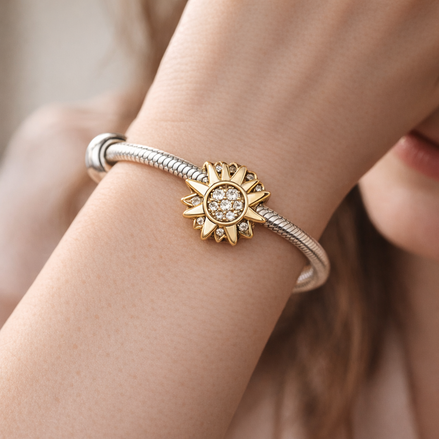 Gold Plated Sunflower Pavé Charm - Gold Plated Sunburst Crystal Charm — worn on wrist