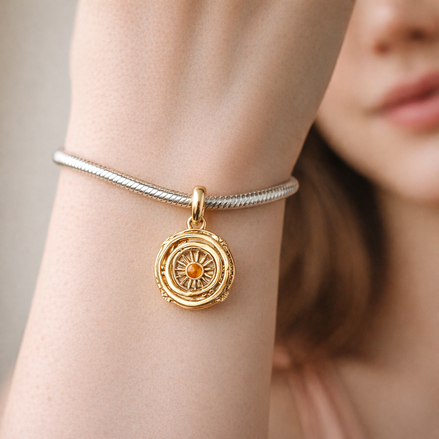 Game of Thrones Spinning Astrolabe Dangle Charm — worn on wrist