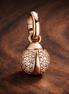 Pandora ME Lucky Ladybird Mini Dangle Charm — display on walnut