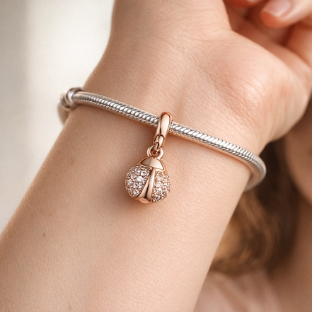 Pandora ME Lucky Ladybird Mini Dangle Charm — worn on wrist