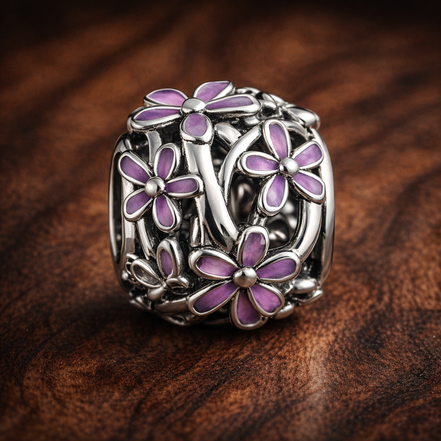 Openwork Purple Daisy Charm — display on walnut