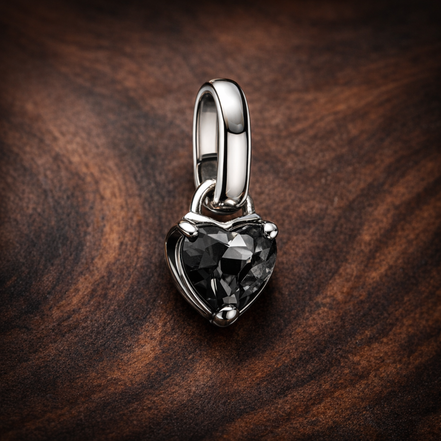 Pandora ME Black Chakra Heart Mini Dangle Charm — display on walnut