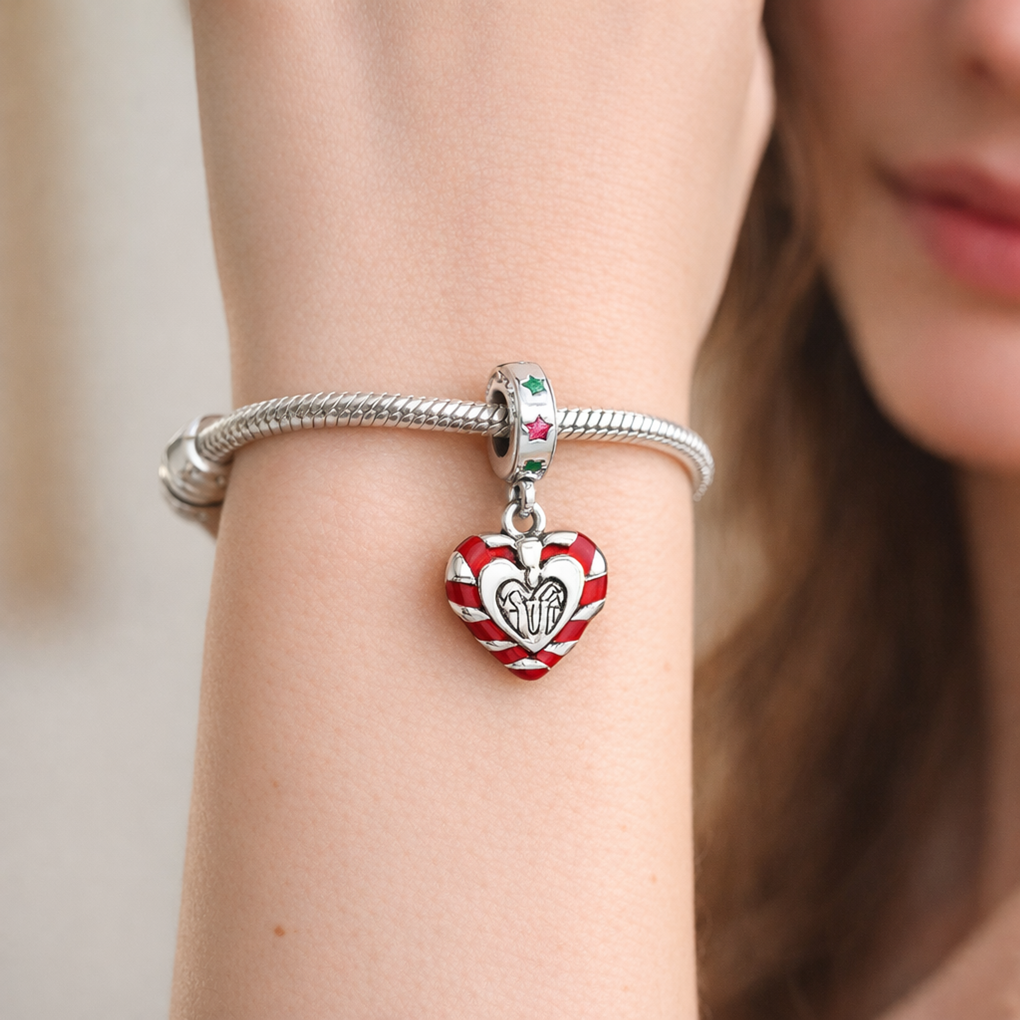 Double Candy Cane Heart Christmas Dangle Charm — worn on wrist