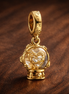 Heart Snowflake Snow Globe Dangle Charm — display on walnut