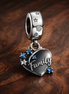 Family Love Double Dangle Charm — display on walnut