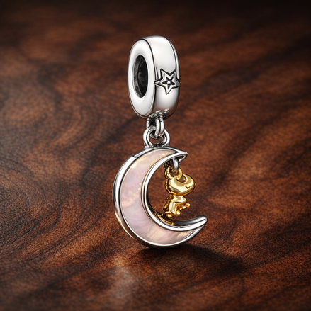 Two-tone Key & Moon Dangle Charm — display on walnut