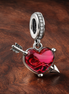 Red Heart & Arrow Murano Glass Dangle Charm — display on walnut