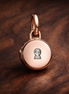 Rose Gold Plated Initial Disc Charm - Rose Gold Plated Initial Disc Charm — display on walnut