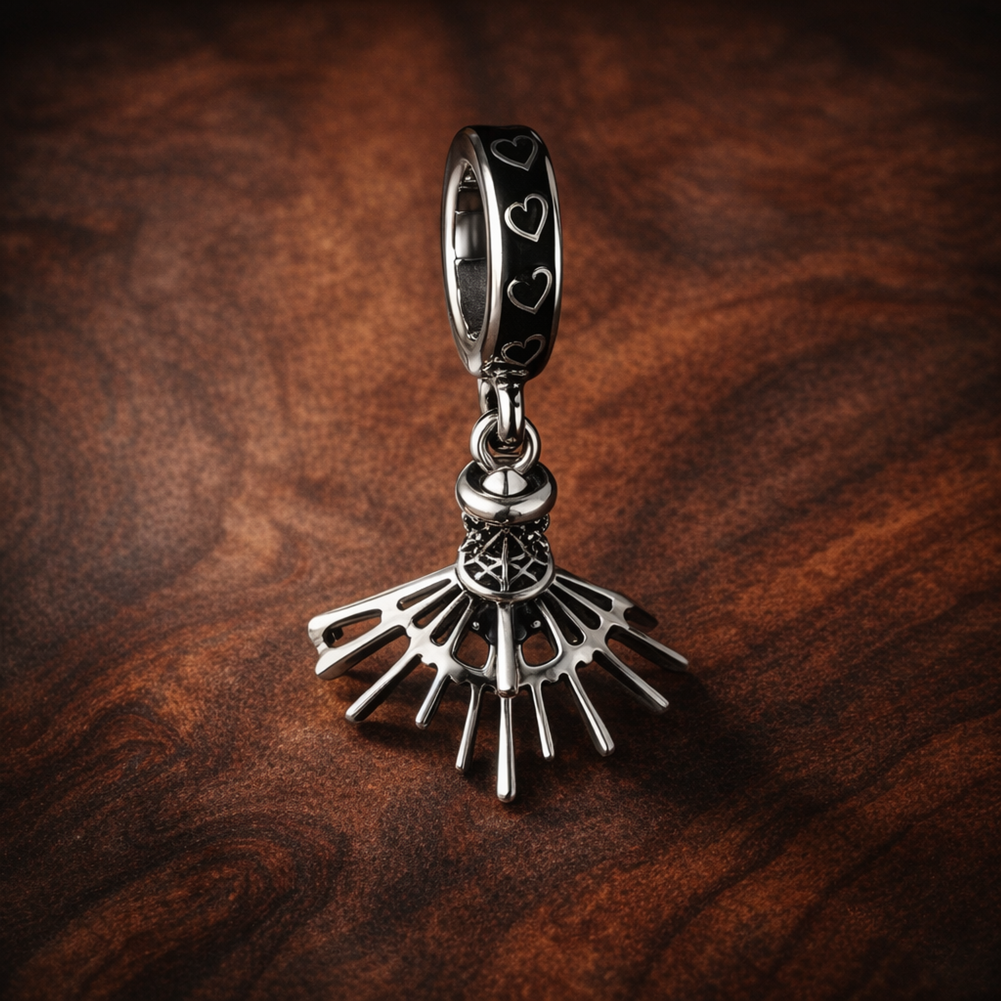 Eyelash Fan Charm - Silver Eye Fan Dangle Charm — display on walnut