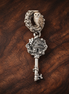 Blush Rose Key Charm - Blush Rose Key Dangle Charm — display on walnut