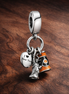 Shopping Bag and Dress Charm - Shopping Bag Fashion Dangle Charm — display on walnut
