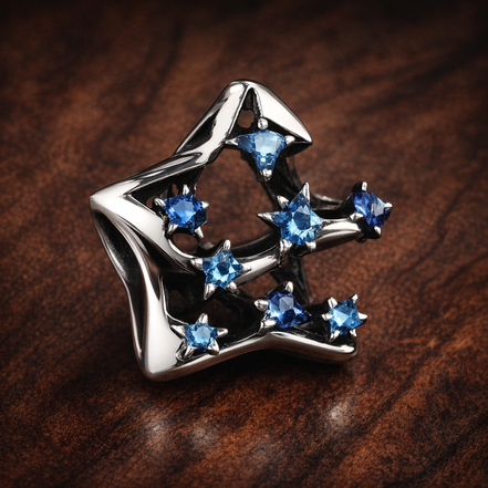 Bold Sparkling Star Charm — display on walnut