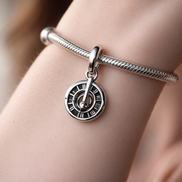 Pandora ME Zodiac Wheel Medallion Charm — worn on wrist