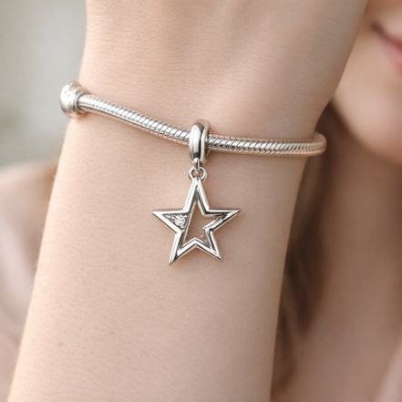 Pandora ME Sparkling Star Medallion Charm — worn on wrist