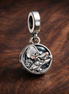 Dolphin Ocean Charm - Blue Dolphin Ocean Dangle Charm — display on walnut